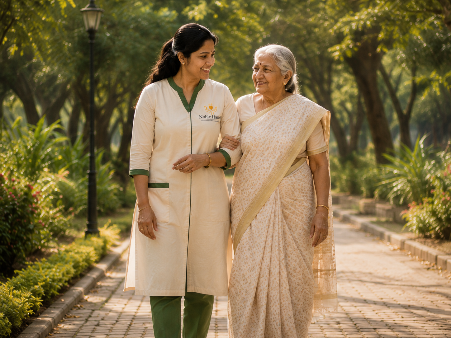 A physiotherapist supporting an older parent in gentle mobility exercises at home